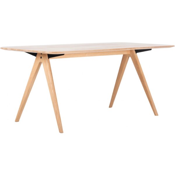 Minimalistischer Esstisch mit schrägen Beinen - Stabilität und Eleganz des ESSTISCH AVA verdeutlicht - Wood Dream Massivholzmöbel